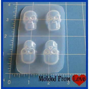 4 Small Skulls Han..