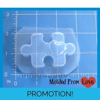 Puzzle Piece With Heart Hand..