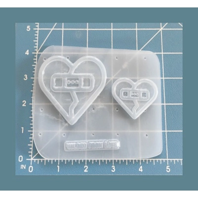 2 Hearts with Bandaids Handmade Plastic Mold 2 Hearts with Bandaids Handmade Plastic Mold