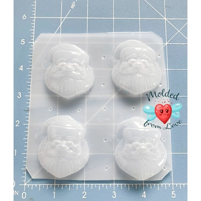 4 bite size small Santa Heads Handmade Plastic mold