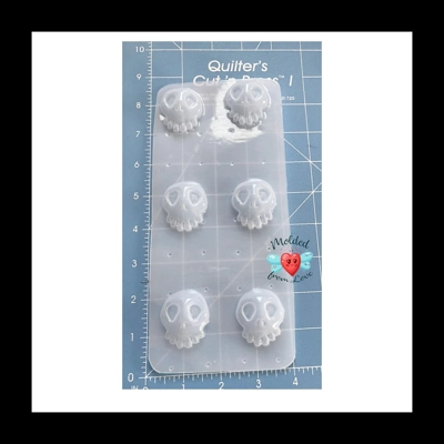 6 Bite Size Small Haunted Skulls Handmade Plastic Mold