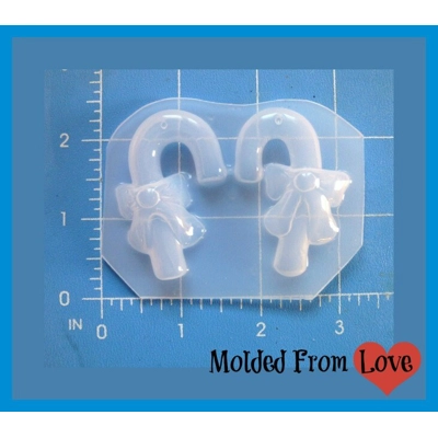 A Pair Of Candy Canes with Bows Handmade Plastic Resin Mold A Pair Of Candy Canes with Bows Handmade Plastic Resin Mold