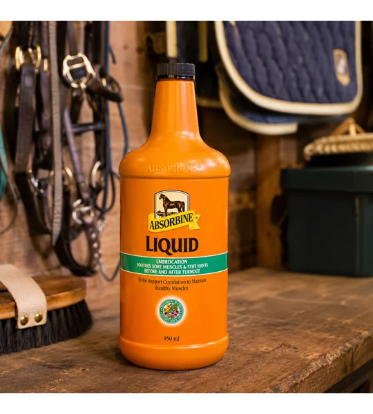 950ml bottle of Absorbine Liquid Embrocation horse liniment for muscle and joint relief