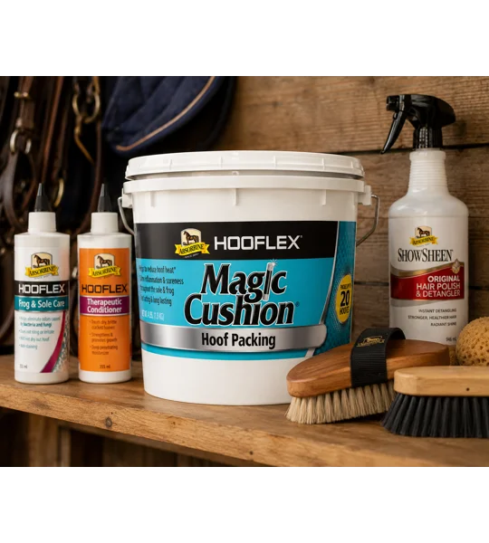 Packing a horse hoof sole with Absorbine Magic Cushion formula to reduce inflammation