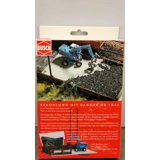 Busch HO. Coal stockpile with excavato..