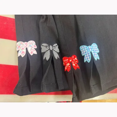 Black & White Gingham Bow Capris by Retro America