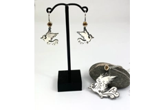 Jo’s Silver Phoenix Pendant With Yellow Sapphire