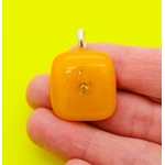 Orange and gold glass necklace pendant