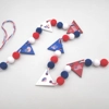 Dolls House Pennant 4th July Garland Bunting 6 Flags and PomPoms Miniature Decoration 1:12 Scale