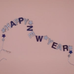 Dolls House Happy New Year Garland Purple and Silver 1:12 Scale Miniature Decoration