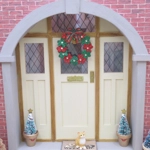 Dolls House Miniature Christmas Wreath with Christmas Flowers and a Tartan Bow 1:12 Scale