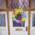 Dolls House Wreath with Miniature Flowers and Yellow Bow 1:12th Scale