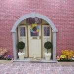 Dolls House Wreath with Miniature Flowers and Yellow Bow 1:12th Scale