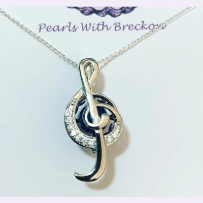 Music Note Cage Pendant