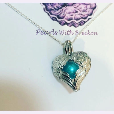 Angel Wing Heart Cage Pendant