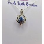 Blue Centered Snowflake Cage Pendant