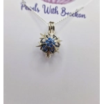 Blue Centered Snowflake Cage Pendant