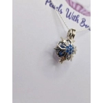Blue Centered Snowflake Cage Pendant