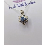 Blue Centered Snowflake Cage Pendant