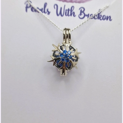 Blue Centered Snowflake Cage Pendant