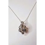 Forget Me Knot Cage Pendant