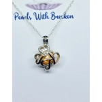 Circle Of Four Cage Pendant