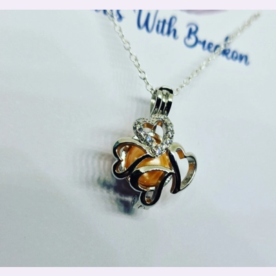 Circle Of Four Cage Pendant