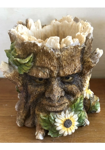 Latex mould for making this small tree man face candle holder