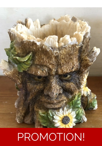 Latex mould for making this small tree man face candle holder