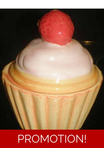 Cupcake topped with Str..