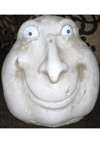 Grinning Stone face