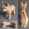 Miniature donkey with large cross