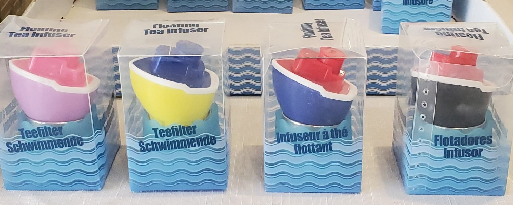 boat shaped, floating, tea balls.