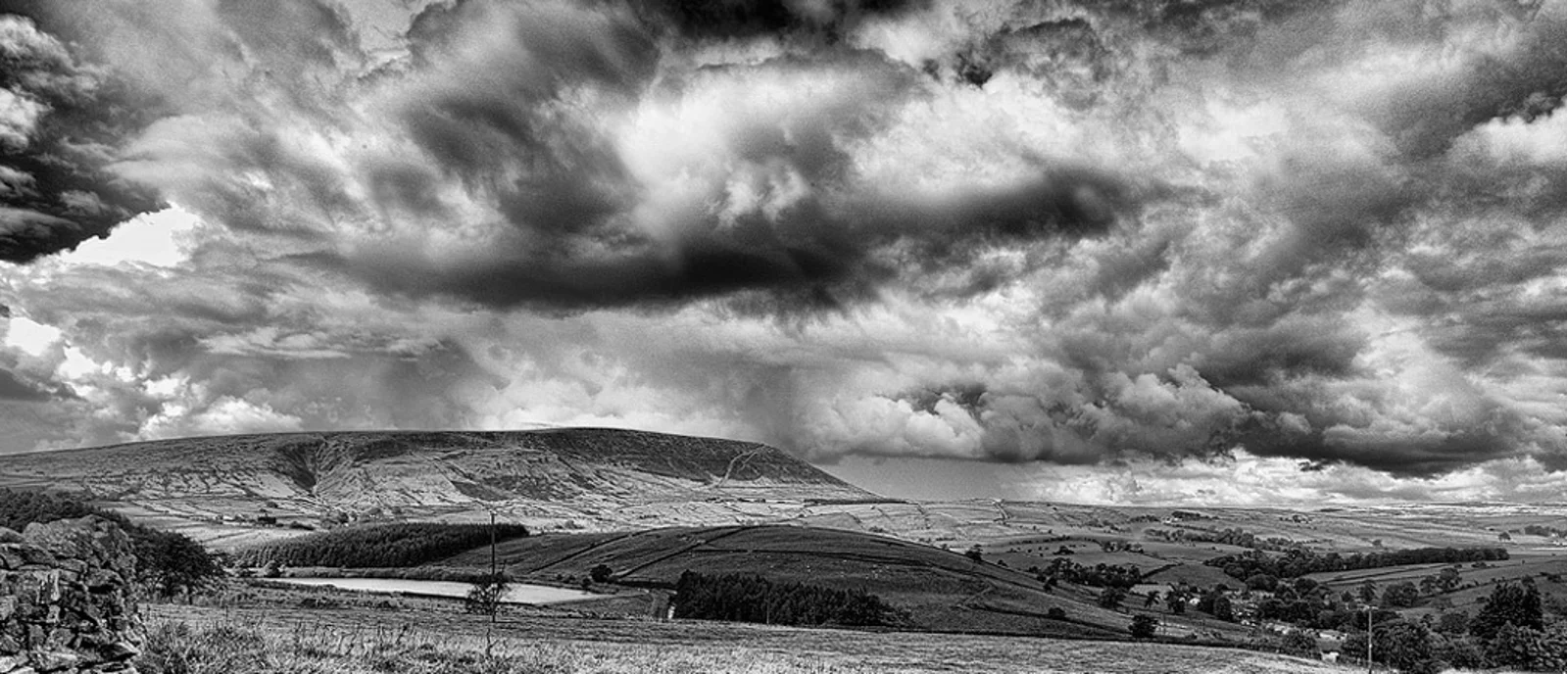 Pendle Hill under storm clouds
