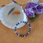 Stretch Bracelet - Blue and Clear Rainbow Plated Rondelle Stretch Bracelet - Blue and Clear Rainbow Plated Rondelle