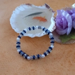 Stretch Bracelet - Blue and Clear Rainbow Plated Rondelle Stretch Bracelet - Blue and Clear Rainbow Plated Rondelle