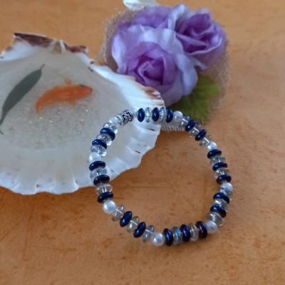 Stretch Bracelet - Blue and Clear Rainbow Plated Rondelle Stretch Bracelet - Blue and Clear Rainbow Plated Rondelle