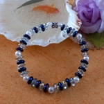 Stretch Bracelet - Blue and Clear Rainbow Plated Rondelle Stretch Bracelet - Blue and Clear Rainbow Plated Rondelle
