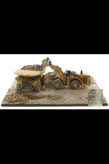 Weathered CAT 994K Loader & 797 Mining Truck 1/1..