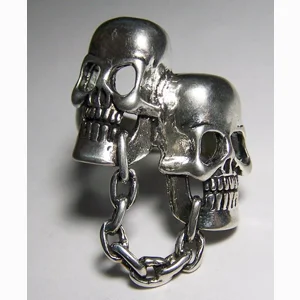 Chained Together Skull Heads Ring