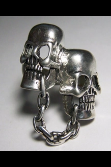 Chained Together Skull Heads Ring