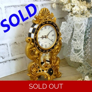 Courtly Mantle Clock Black and White Checked Baroque Clock with Cherubs