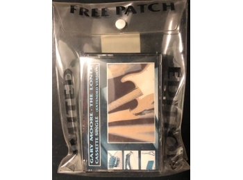 Gary Moore - The Loner Extended Version - UK Limited Edition 3 Track Cassette Single In Custom Pouch c/w Free Patch