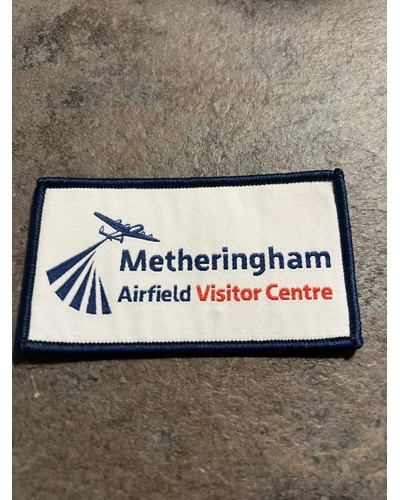 Printed material badge