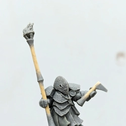 Rust goblin champion with standard