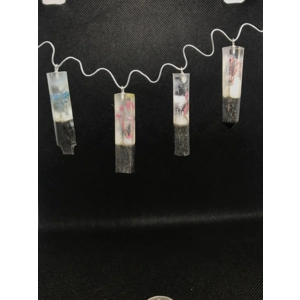 Resin pendant with flower in mist