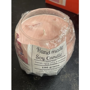 Love spell candle with pink crystals