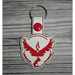 Poke red team keychain