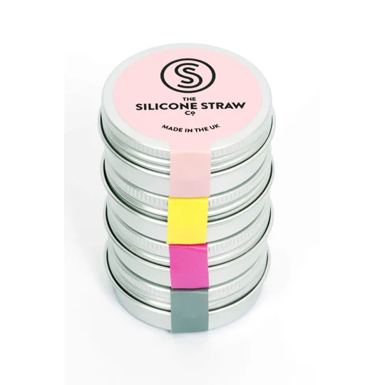 A collection of 4 reusable straws in travel tins