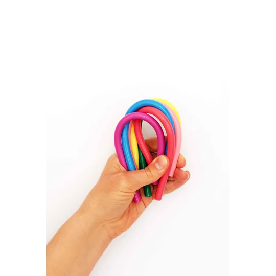 a hand bending a range of silicone straws